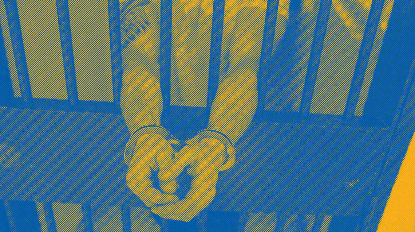 hands between jail cell bars