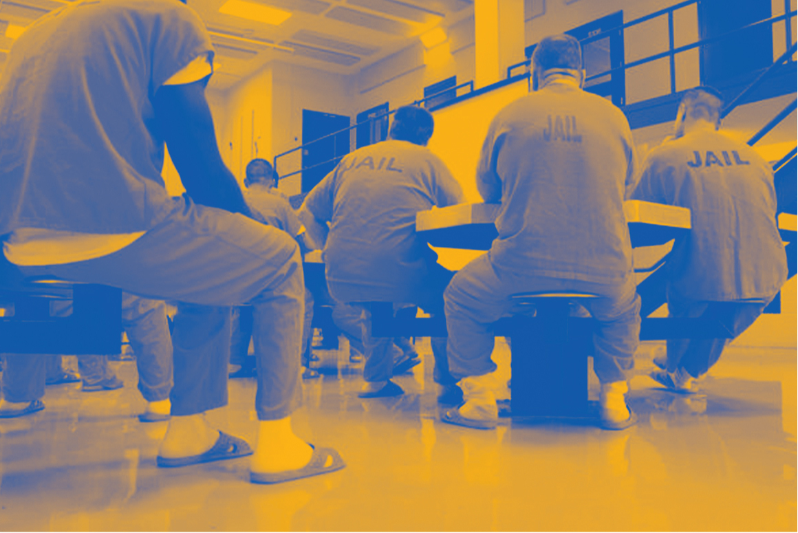 Inmates gather in a Texas carceral facilities with a dual tone yellow and blue treatment