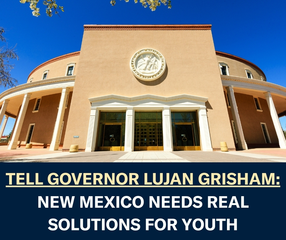 An image of the New Mexico State Capitol with text underneath that reads Tell Governor Lujan Grisham: New Mexico needs real solutions for youth